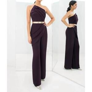 NEW DAYMOR strapless asymmetric neck jumpsuit in aubergine